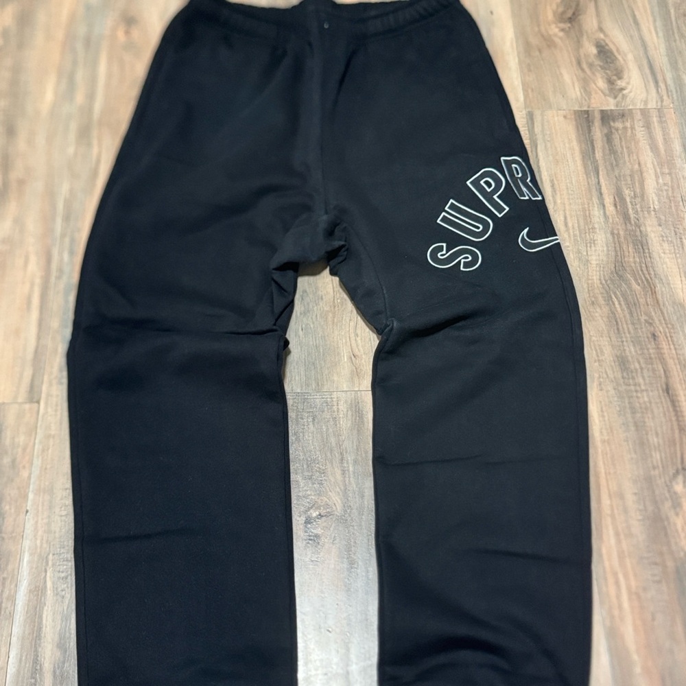 Supreme Black Sweatpants with Bold Lettering